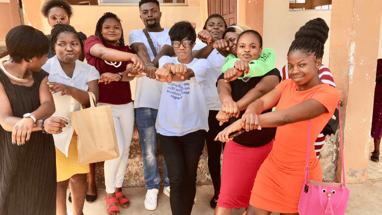 My cover photo portrays young girls and myself at the university of Bamenda Plus a single mâle we came together to learn on ways to curb Rape making sure men are involved 