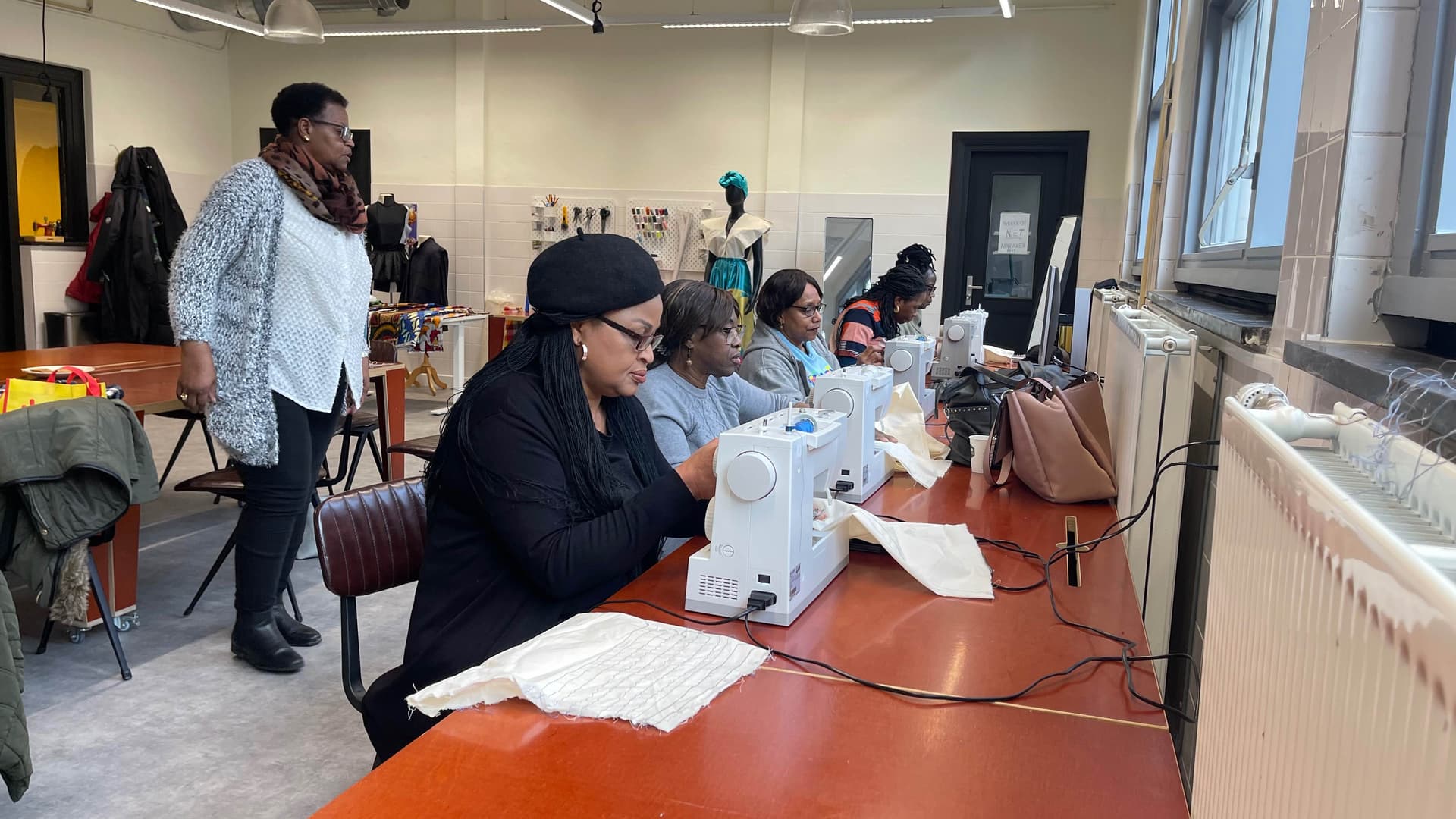 The ladies just learnt how to make a dress and they are going to make their first design 
