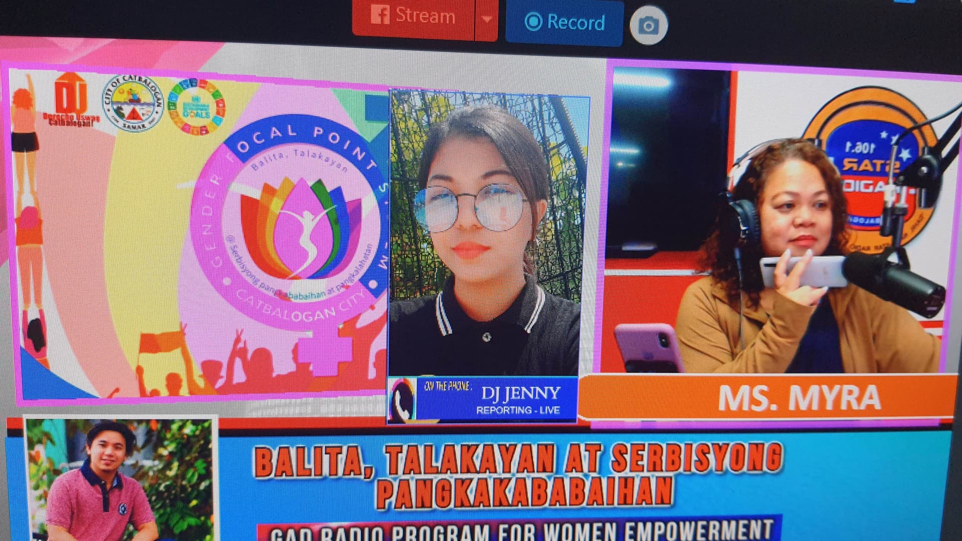 The picture shows the on-going program where I am hosting and DJ Jenny doing a on-field broadcast report.
