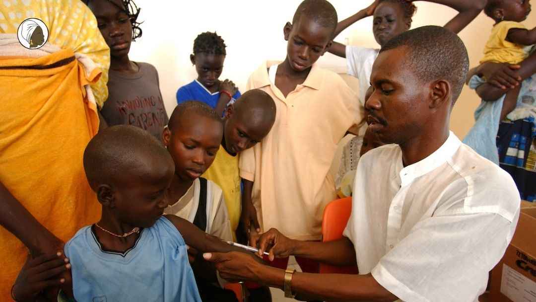 Children receiving vaccination shots (pre-covid) @ Al shifa clinic , Kaolack, Senegal, West Africa.