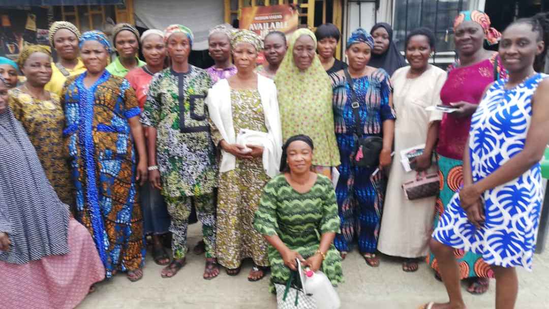 Cross section of women outside the meeting venue