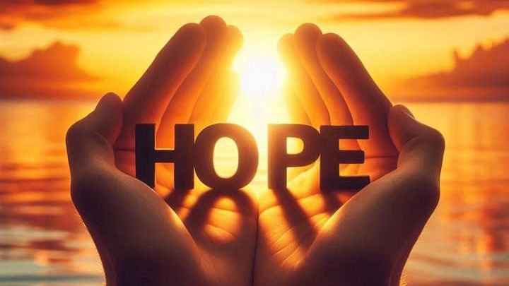 The photo of hope in both hands , it represents the belief that we can hold and offer hope and change through our own hands, without resorting to violence.