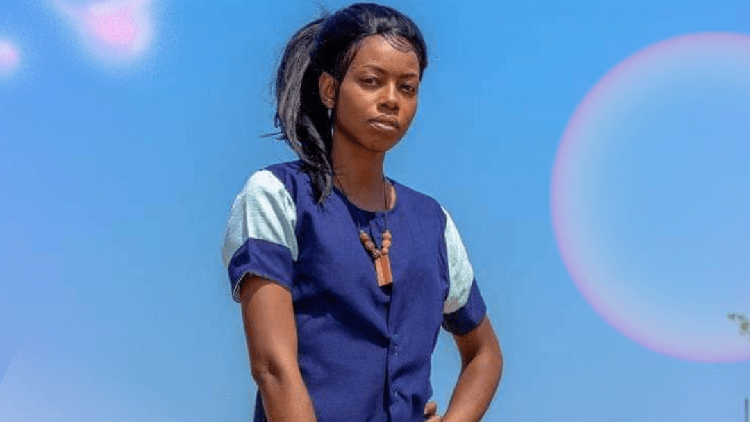 Founding director posing for a photo during a fashion photoshoot